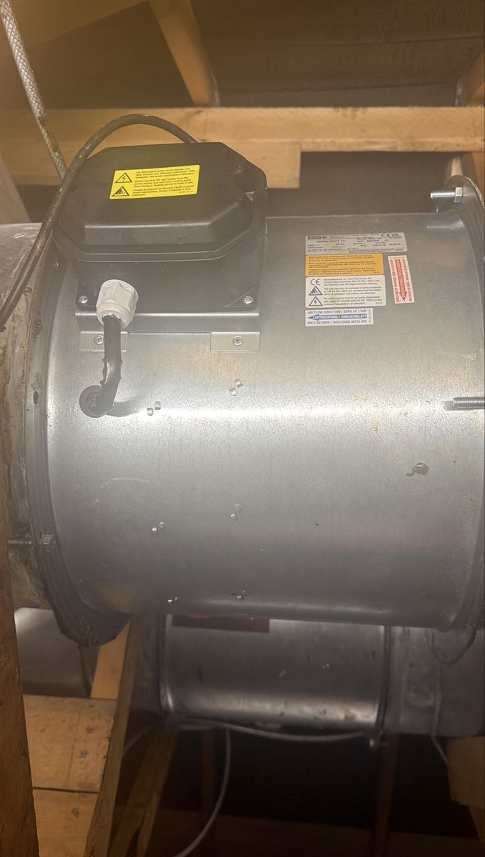 New cased extraction fan fitted in a roof space